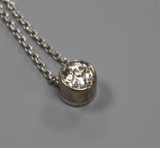 An 18ct white gold and diamond solitaire pendant necklace,